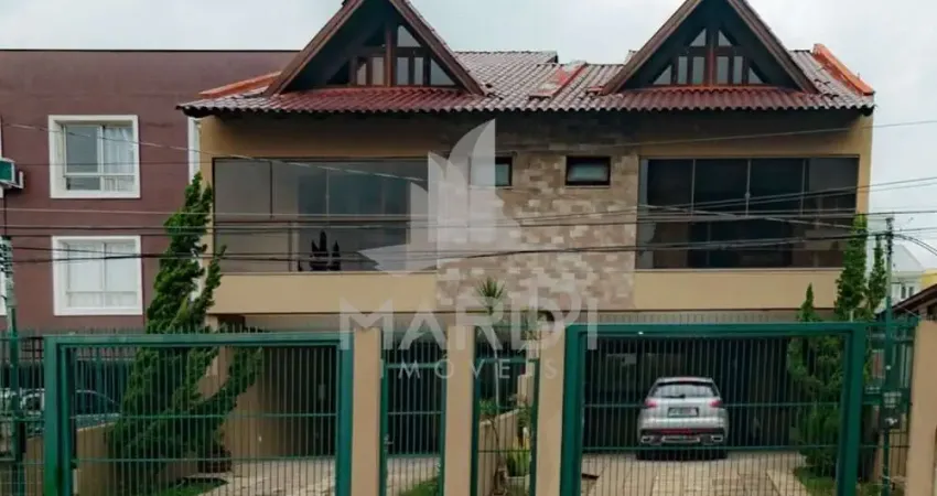 Casa com 3 quartos à venda na Rua Dom Jaime de Barros Câmara, 705, Sarandi, Porto Alegre