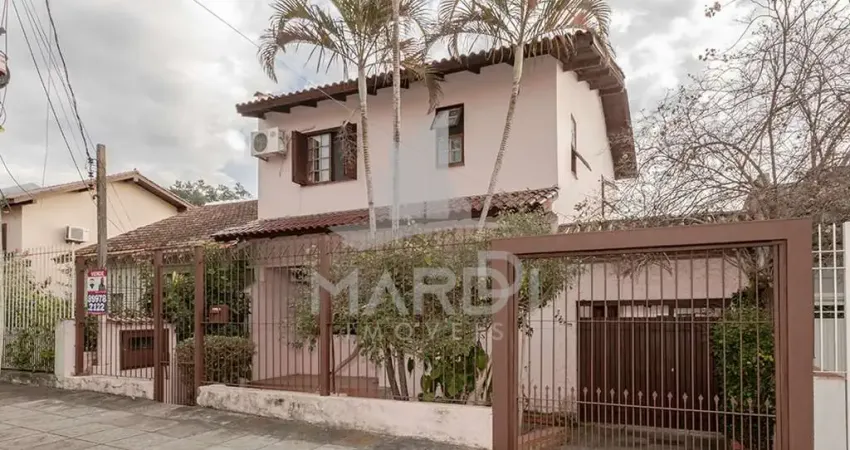 Casa com 4 quartos à venda na Rua Três Passos, 107, Passo da Areia, Porto Alegre