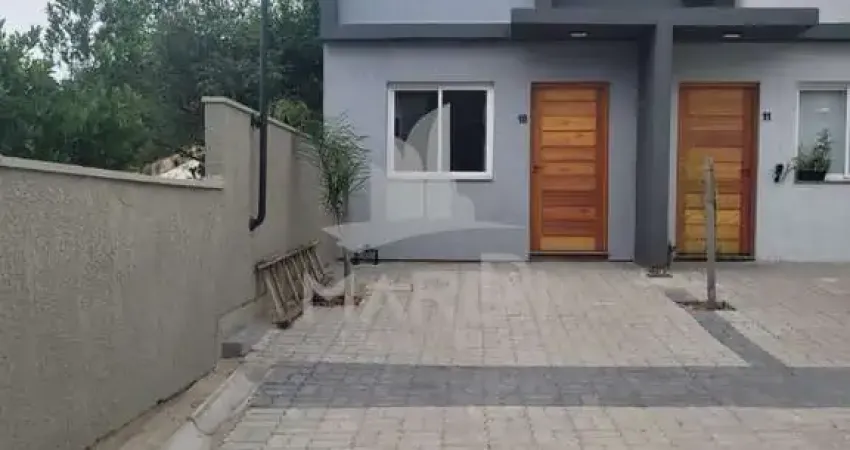 Casa em condomínio fechado com 2 quartos para alugar na Rua Miguel Ascoleze, 125, Vila Nova, Porto Alegre