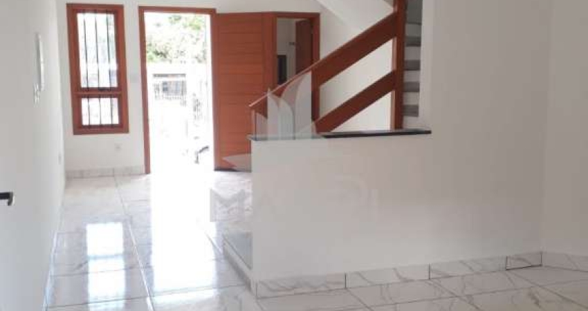 Casa com 2 quartos à venda na Rua Helio Felix Frey, 130, Guarujá, Porto Alegre