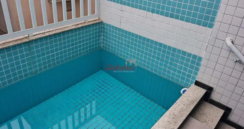 Bela casa sobreposta duplex em Santos no bairro da Aparecida com 3 dormitórios, uma suíte e piscina a venda por R$ 1.180.000,00.