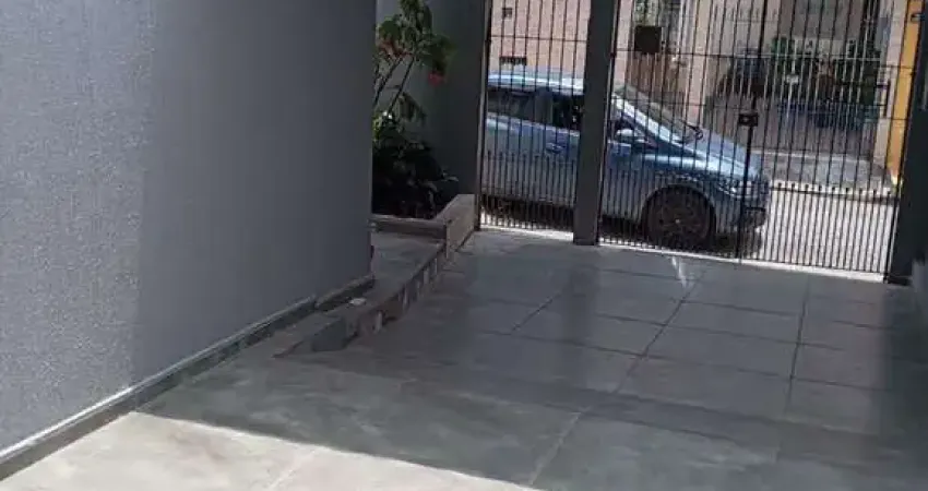 Casa com 03 dormitórios com 02 vagas de garagem no bairro Jardim Bonifácio