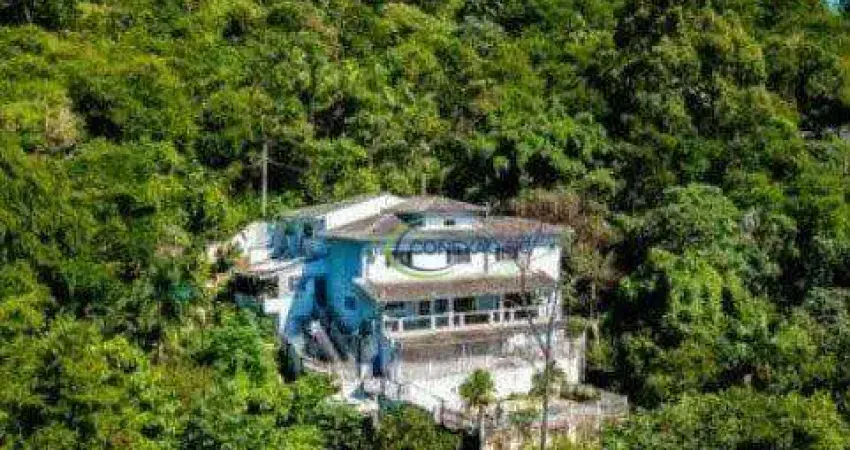 Sobrado com 3 dormitórios à venda, 384 m² por R$ 1.800.000,00 - Cigarras - São Sebastião/SP