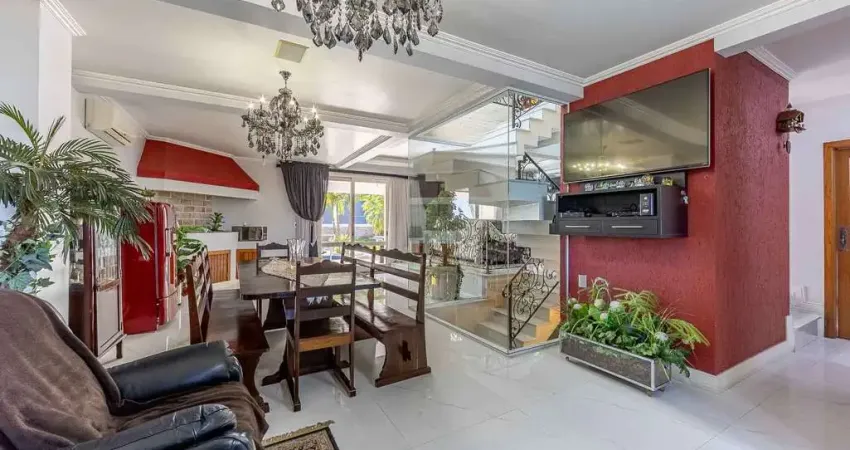 Casa em condomínio fechado com 4 quartos à venda na Avenida General Barreto Viana, 195, Chácara das Pedras, Porto Alegre