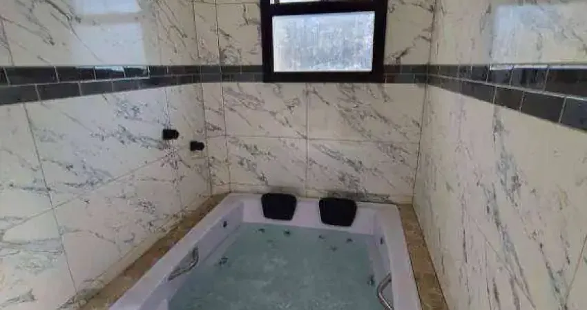 Sobrado com 2 dormitórios à venda, 115 m² por R$ 650.000,00 - Vilamar - Praia Grande/SP