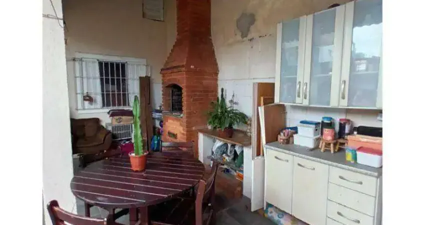 Casa com 3 dormitórios à venda, 212 m² por R$ 750.000,00 - Vila Guilhermina - Praia Grande/SP