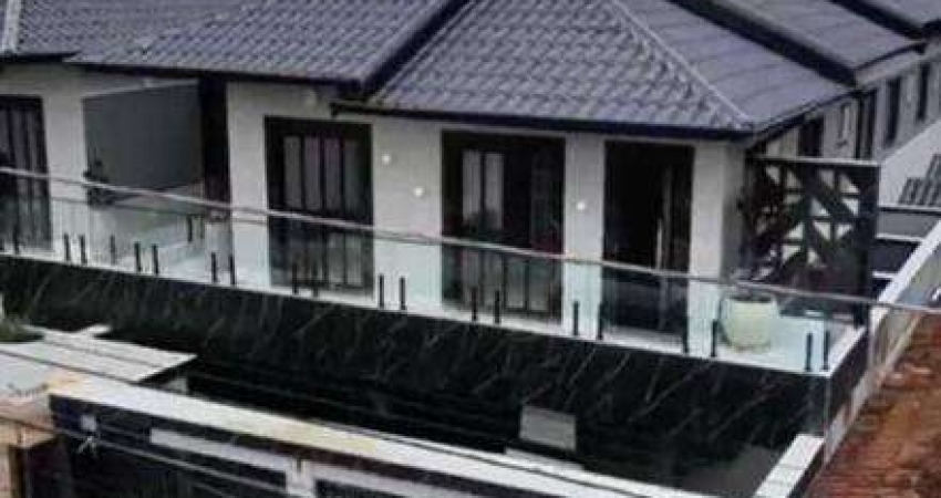 Casa com 2 dormitórios à venda, 54 m² por R$ 330.000,00 - Balneário Pires - Praia Grande/SP