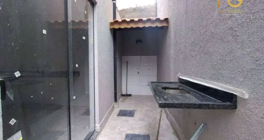 Casa assobradada em condominio 02 dormitorios 01 banheiro 01 lavabo - quintal - guilhermina/praia grande-sp