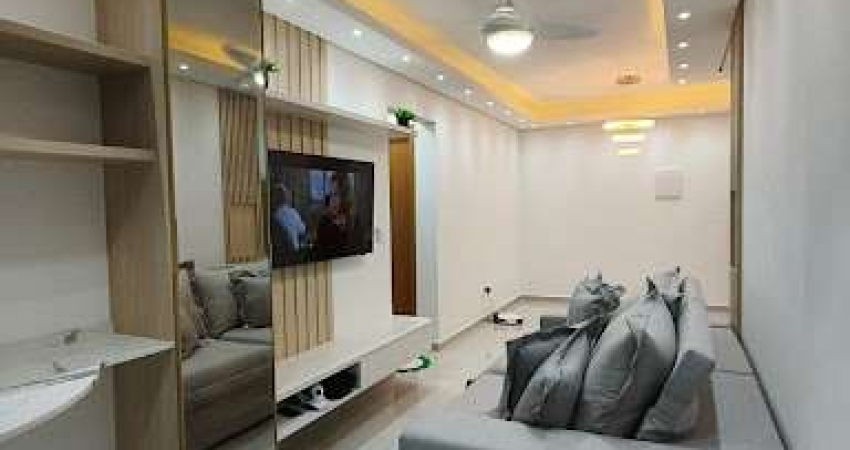 Apartamento com 2 dormitórios à venda, 66 m² por R$ 600.000,00 - Mirim - Praia Grande/SP