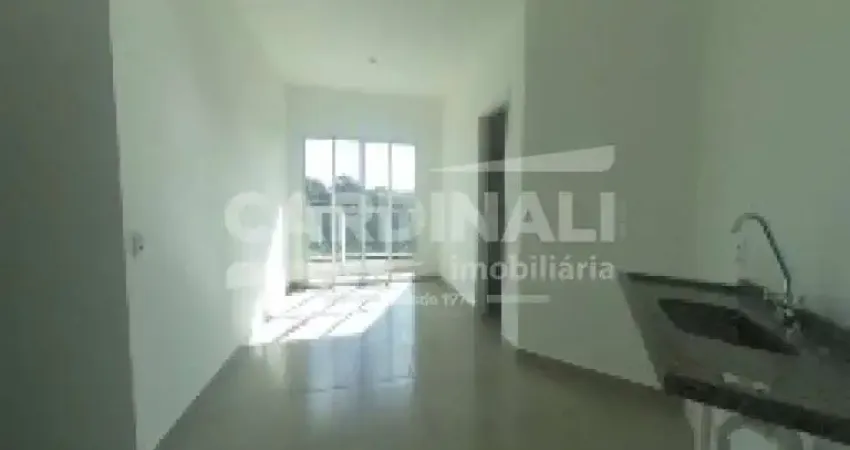 apartamento de dois dormitórios sendo um suíte com uma vaga de garagem.
