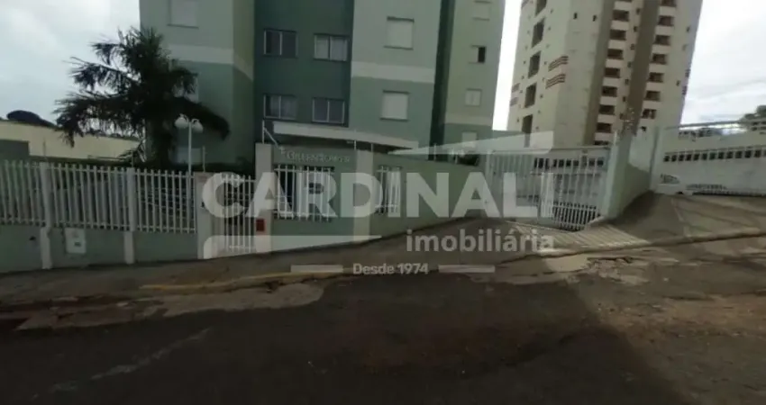 apartamento de dois dormitórios com uma vaga coberta.