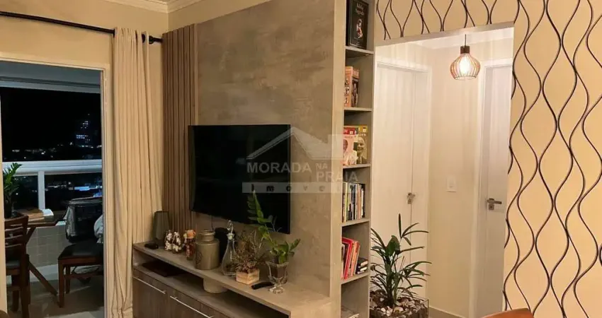 Apartamento mobiliado no canto do forte, 2 dormitórios, terraço gourmet, confira em praia grande.