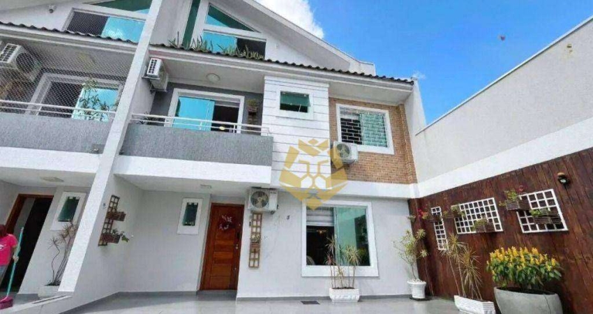 Sobrado com 3 dormitórios para alugar, 132 m² por R$ 5.385,00/mês - Uberaba - Curitiba/PR