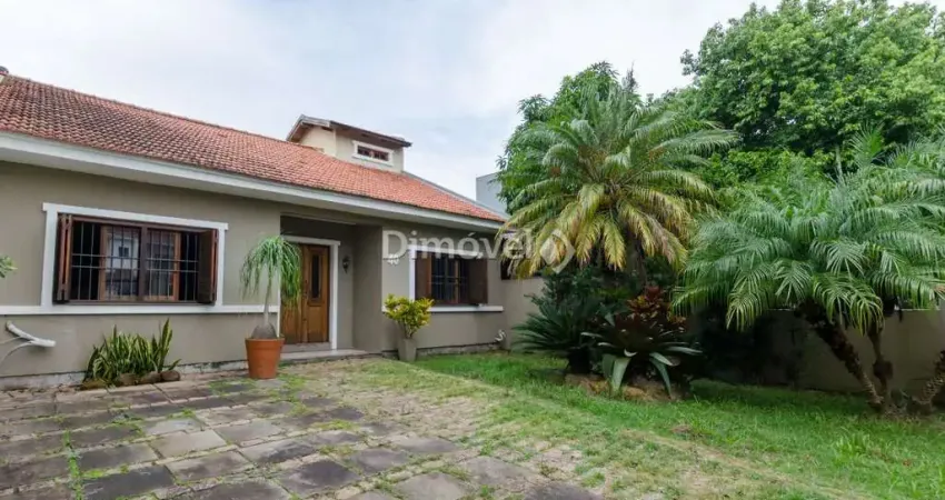Casa com 3 quartos à venda na Rua Jayme Saul de Borba, 40, Guarujá, Porto Alegre