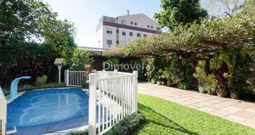 Casa com 3 quartos à venda na Rua Inhanduí, 252, Cristal, Porto Alegre