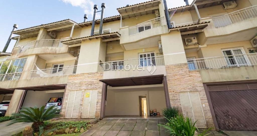 Casa em condomínio fechado com 3 quartos à venda na Avenida Coronel Marcos, 39, Pedra Redonda, Porto Alegre