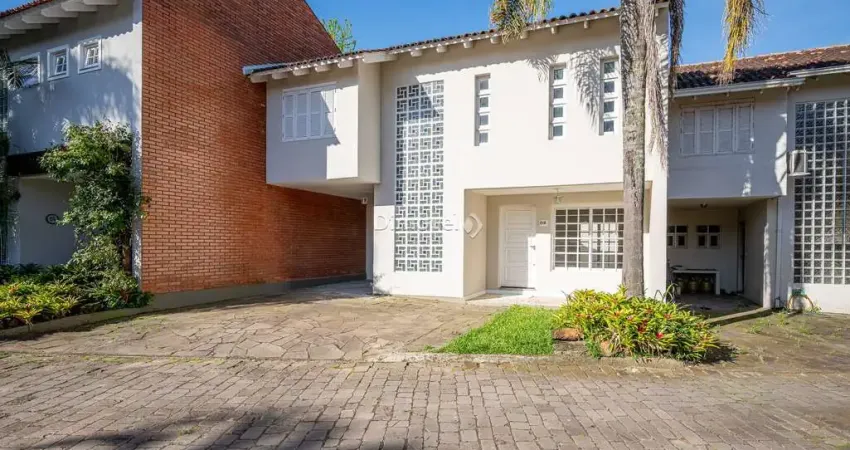 Casa em condomínio fechado com 4 quartos à venda na Rua Conrado Ferrari, 71, Jardim Isabel, Porto Alegre