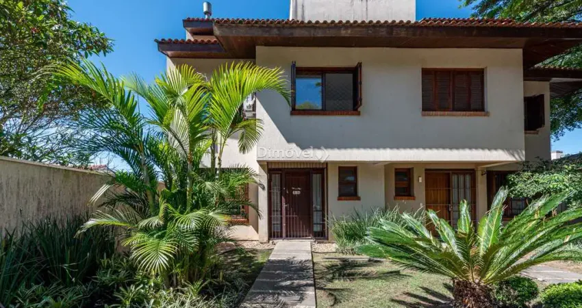 Casa em condomínio fechado com 3 quartos à venda na Avenida Jacuí, 700, Cristal, Porto Alegre