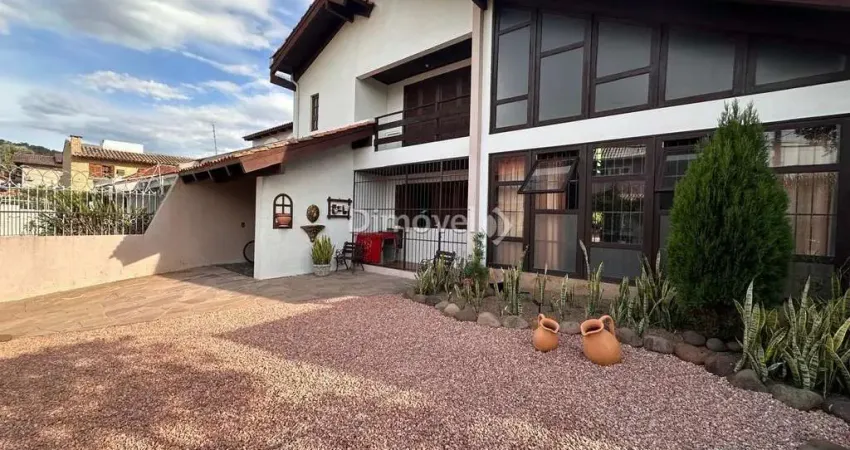 Casa com 3 quartos à venda na Rua Jacipuia, 295, Guarujá, Porto Alegre
