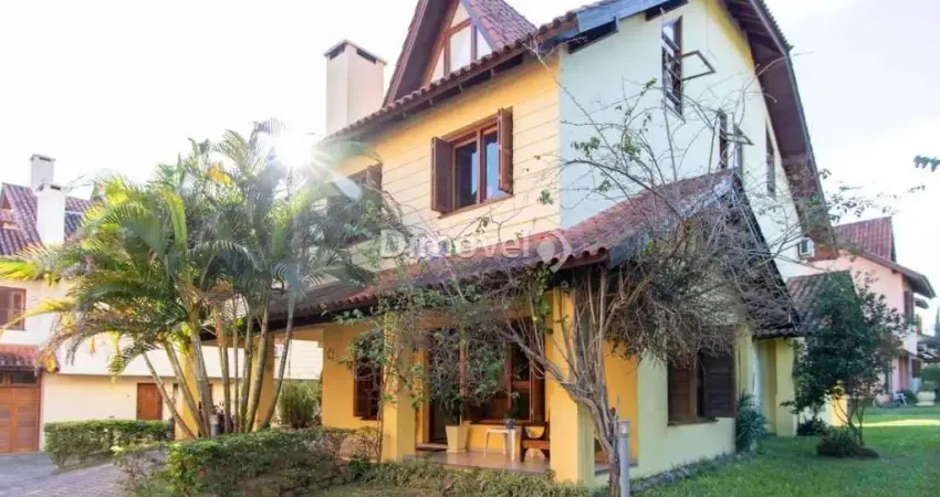 Casa em condomínio fechado com 3 quartos à venda na Rua Luís Felipe Monmany, 101, Guarujá, Porto Alegre
