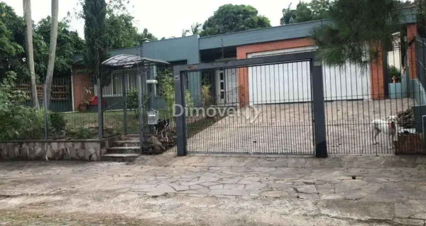 Casa com 4 quartos à venda na Rua Potiguara, 181, Vila Assunção, Porto Alegre