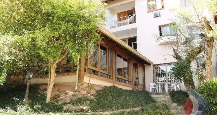Casa com 3 quartos à venda na Rua Edgar Luiz Schneider, 55, Jardim Isabel, Porto Alegre