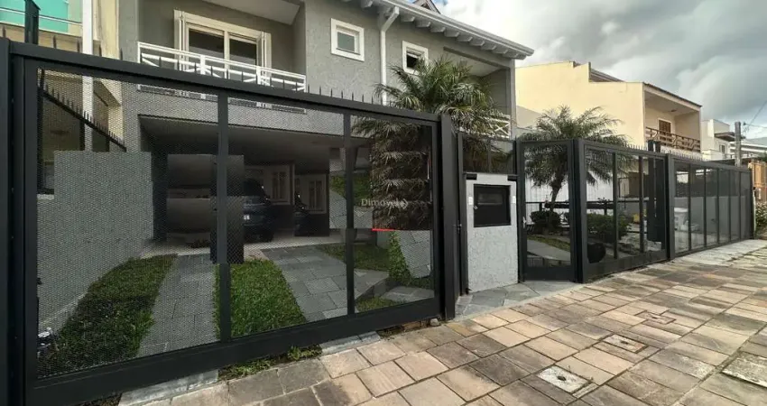 Casa em condomínio fechado com 3 quartos para alugar na Rua Pau Brasil, 490, Hípica, Porto Alegre