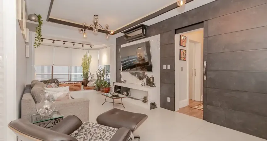 Amplo e elegante apartamento de 2 dormitórios, com 111m² privativos, no coração do Menino Deus.