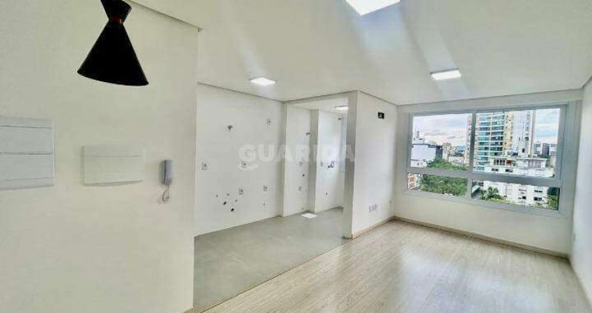 Apartamento com 1 dormitório suíte para alugar no bairro Menino Deus