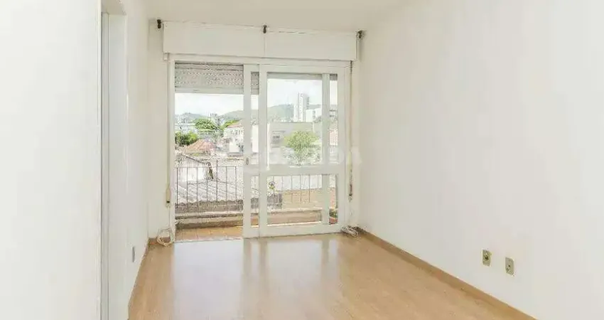 Apartamento com 1 dormitório e 1 vaga de garagem, no bairro Partenon