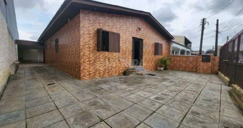 Casa com 3 dormitórios, sendo 1 suíte, e 4 vagas de garagem no bairro Sarandi