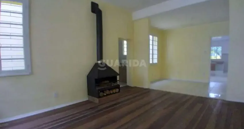 Casa comercial com 5 salas e 120m² no bairro Partenon