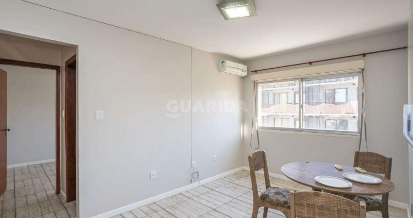 Apartamento mobiliado com 1 dormitório e 1 vaga de garagem no bairro Cidade Baixa!