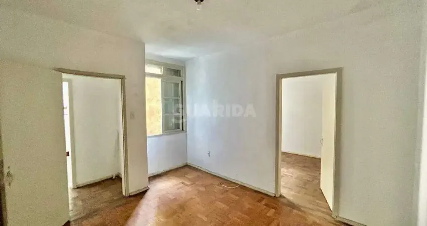 Apartamento com 1 dormitório suíte para alugar no bairro Centro.