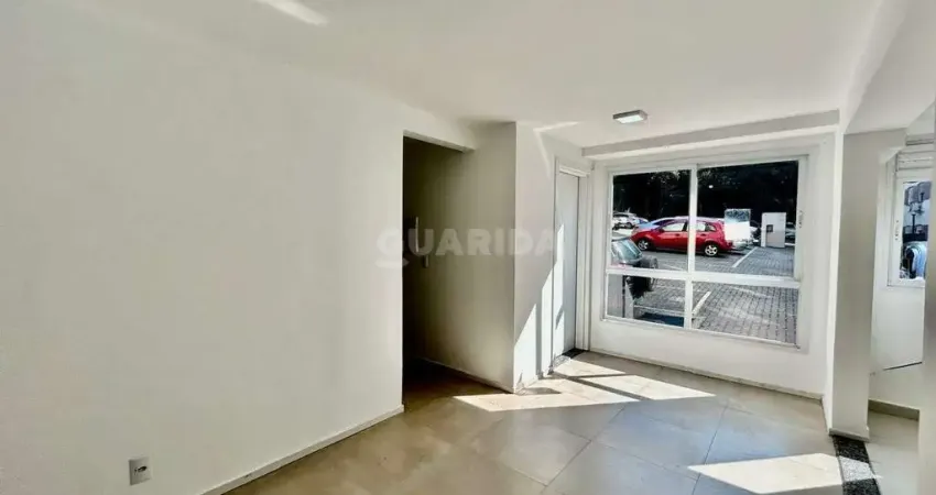 Apartamento térreo com 2 dormitórios e 1 vaga de garagem no bairro Vila Nova - Porto Alegre/RS