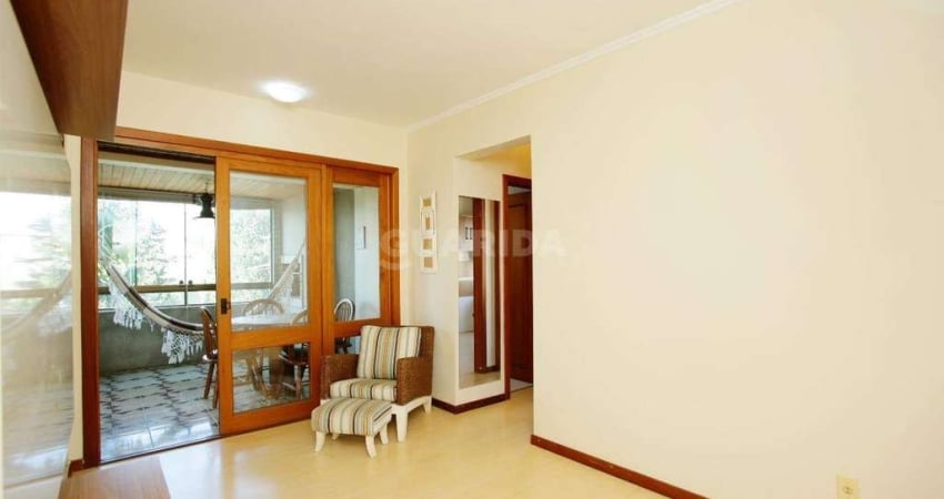 Apartamento semimobiliado com 2 dormitórios e 1 vaga de garagem no bairro Chácara das Pedras