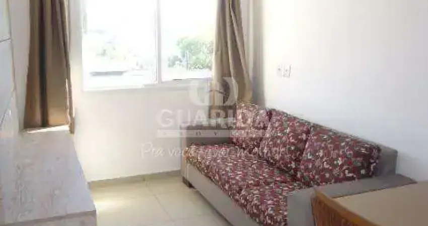 Apartamento de 1 dormitório mobiliado com 1 vaga de garagem no bairro jardim Botânico.