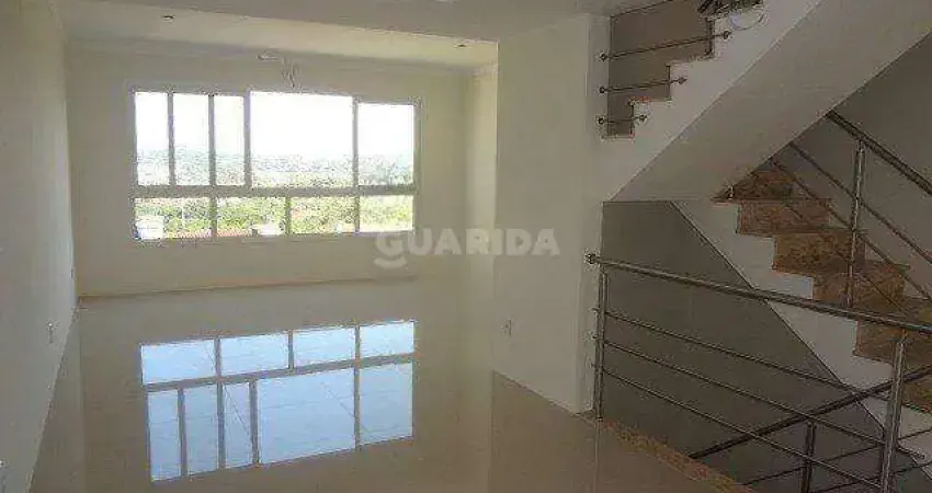 Casa com 3 dormitórios, sendo 1 suíte para alugar no bairro guarujá.