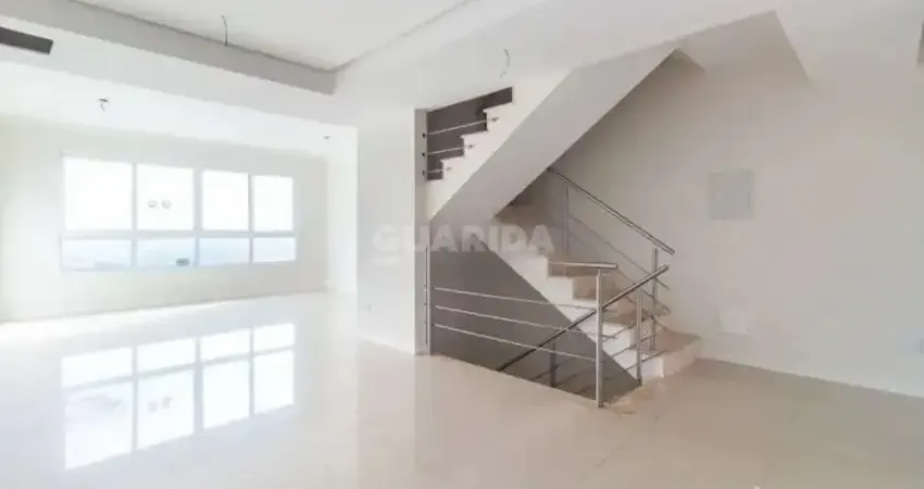 Casa com 3 dormitórios, sendo 1 suíte para alugar no bairro guarujá.