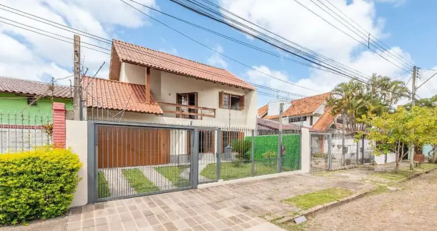 Casa residencial de 3 dormitórios, sendo 1 suíte, no bairro partenon.