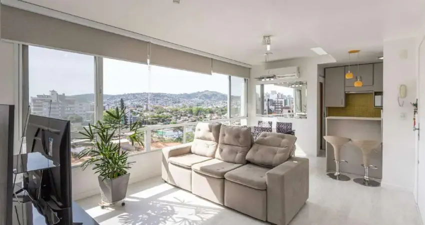 Apartamento mobiliado com 2 dormitórios, sendo 1 suíte, e 2 vagas de garagem no bairro jardim botânico