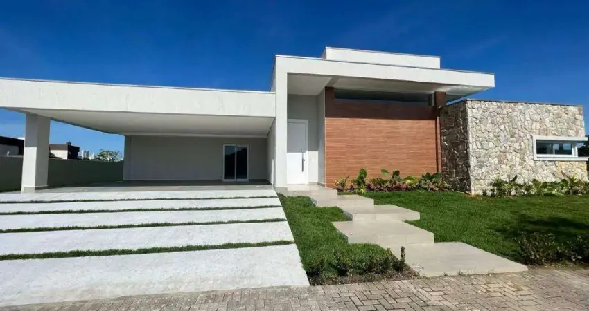 CASA EM CONDOMÍNIO FECHADO - 4 SUÍTES - 4 VAGAS - À 10 MINUTOS DA PRAIA - ÁREA DE LAZER