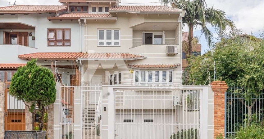 Casa com 3 quartos à venda na Rua Professor Isidoro La Porta, 112, Jardim Planalto, Porto Alegre