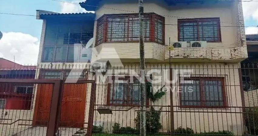 Casa com 3 quartos à venda na Rua General Telino Chagastelles, 245, Parque Santa Fé, Porto Alegre