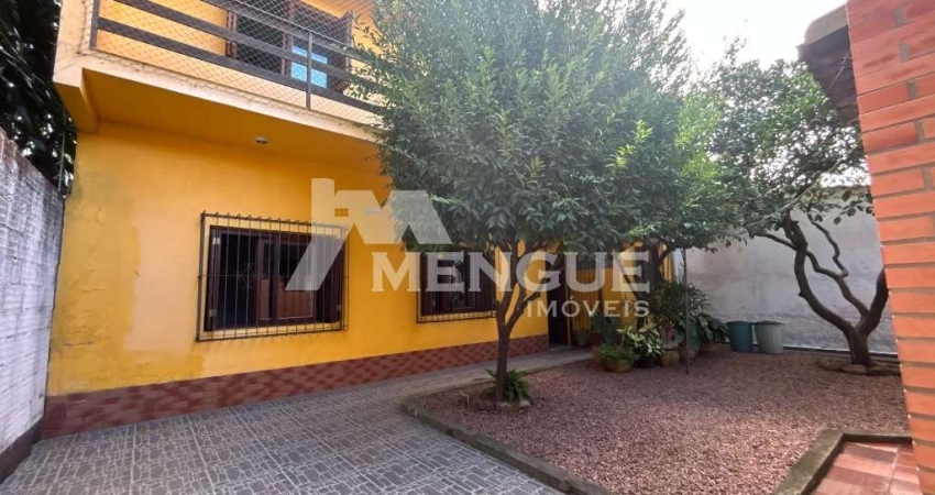 Casa com 4 quartos à venda na Avenida Teixeira Mendes, 328, Chácara das Pedras, Porto Alegre