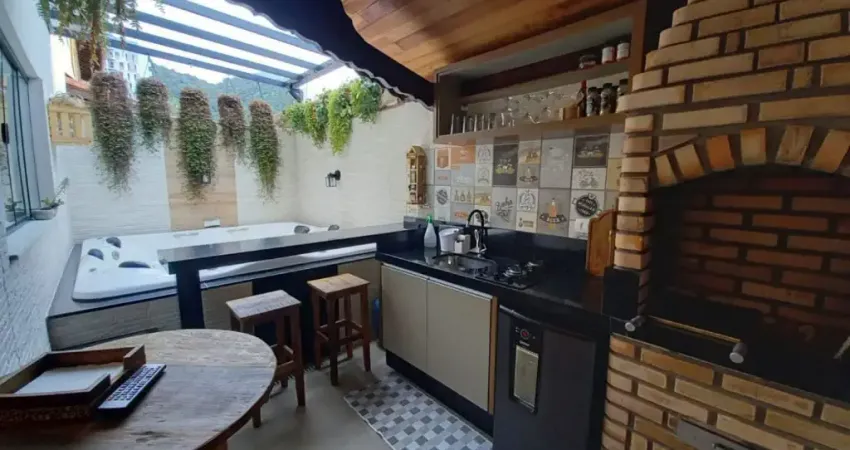 Sobrado com 3 dormitórios à venda, 175 m² por R$ 1.360.000,00 - Canto do Forte - Praia Grande/SP