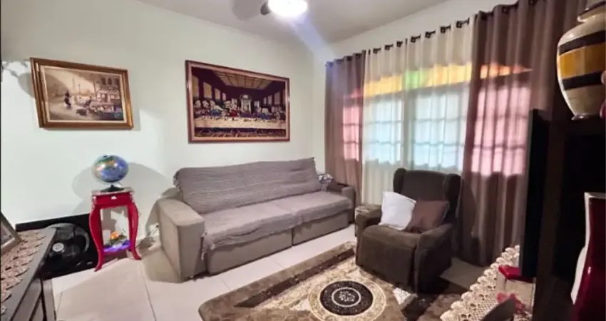 Casa com 2 dormitórios à venda, 94 m² por R$ 440.000 - Caiçara - Praia Grande/SP