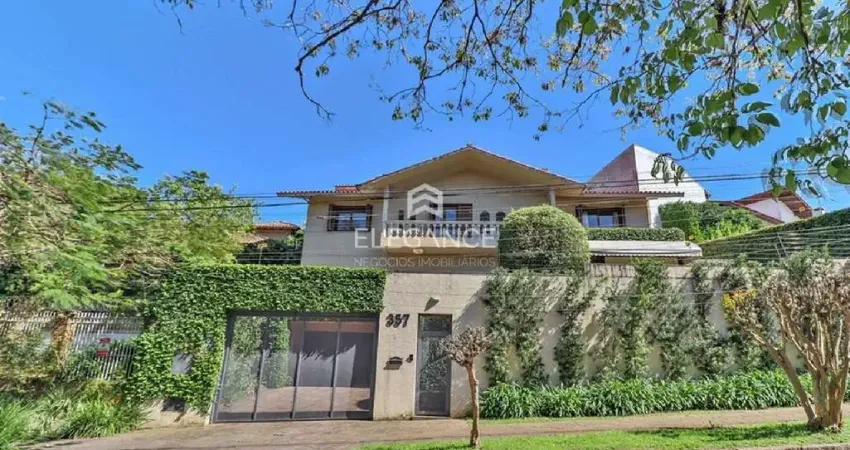 Imperdível casa à venda em porto alegre-rs, bairro três figueiras, 4 dormitórios, 1 suíte, 7 banheiros, 4 vagas, 640m2. elegance imóveis