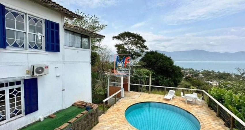 Excelente casa região central de Ilhabela SP,  320 m² a.c., 1.470 m² a.t., 6 suítes, lareira, piscina, vista para o mar (REF 20.619)
