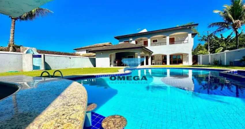 Casa reformada com 5 Suítes à venda no Jd. Acapulco em Guarujá.